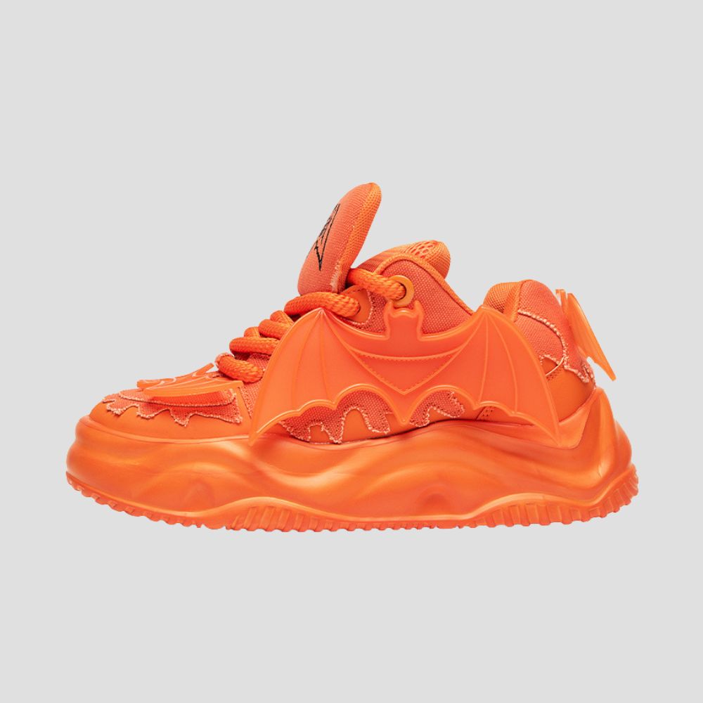 Luminescent bat sneakers for a unique nighttime look