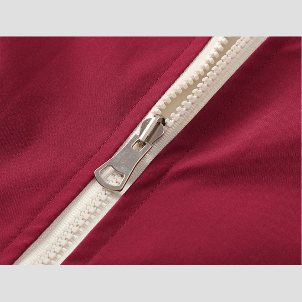 Trendy jacket with zipper closure and modern aesthetic.