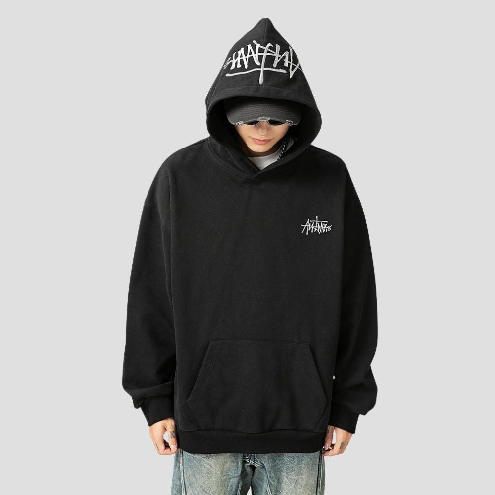 Front pocket of the Hand-Drawn Letter Hoodie, designed for functionality and style.