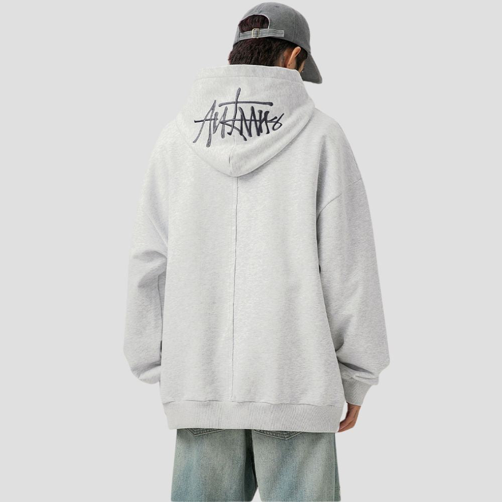 The hood of the Hand-Drawn Letter Hoodie, providing warmth and a fashionable look.