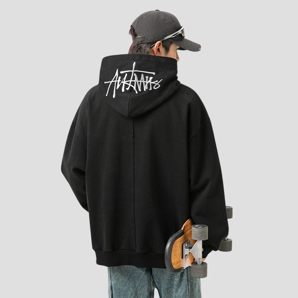 Front pocket of the Hand-Drawn Letter Hoodie, designed for functionality and style.