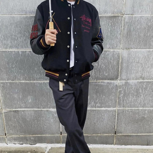 From casual to dressy, this wool blend baseball jacket is a versatile addition to any wardrobe.