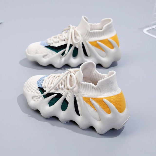 Octopus Yeezy sneakers worn on foot