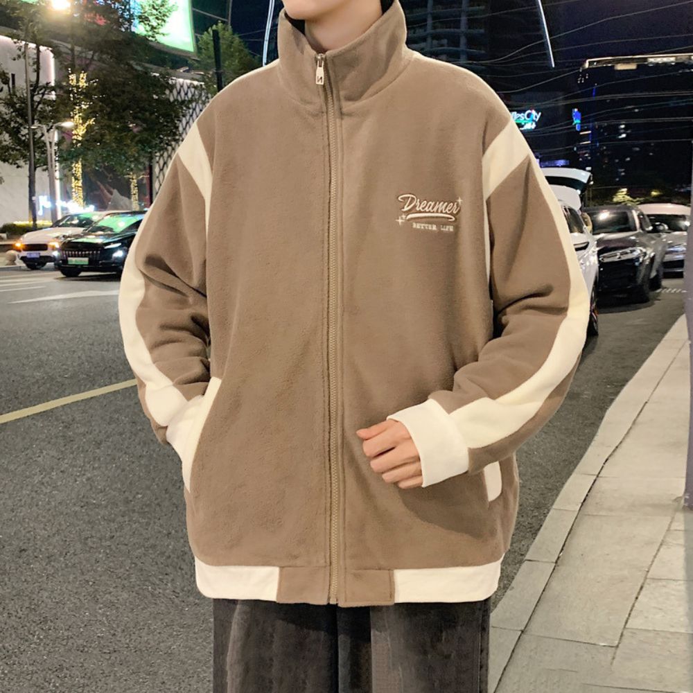 Model wearing the Patchwork Embroidered Jacket in an outdoor setting.