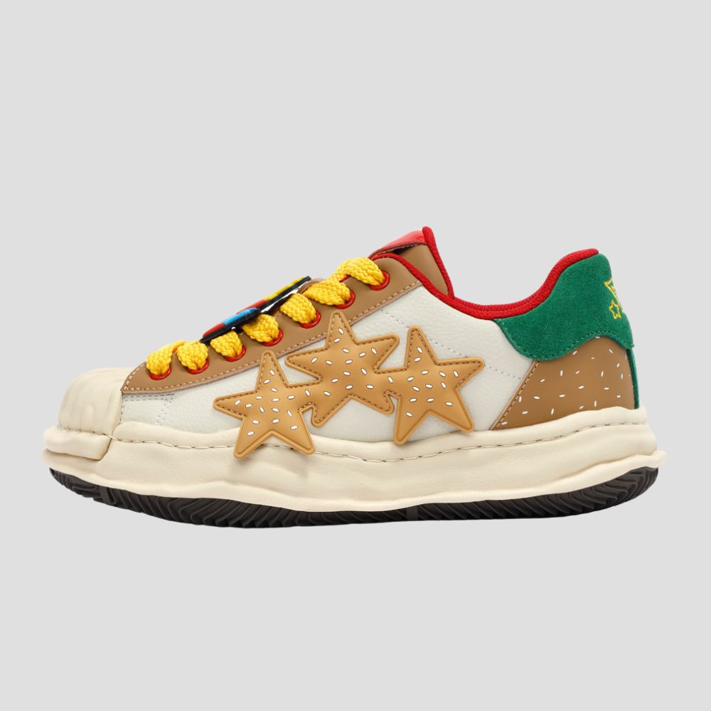 Elevate your style with our retro-inspired leather sneakers featuring a shell toe design.