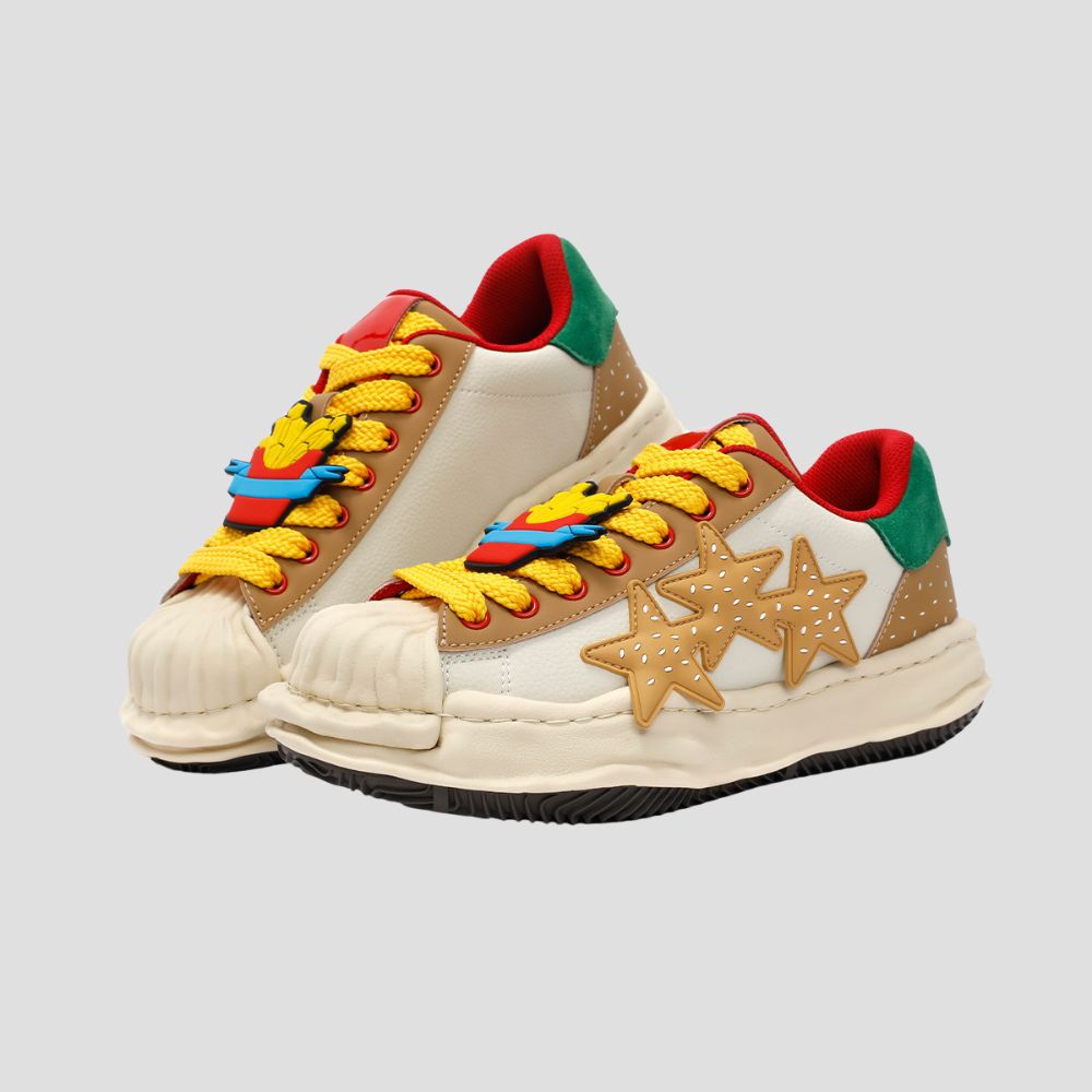 Stand out in any crowd with the unique shell toe detail on these leather low-tops.