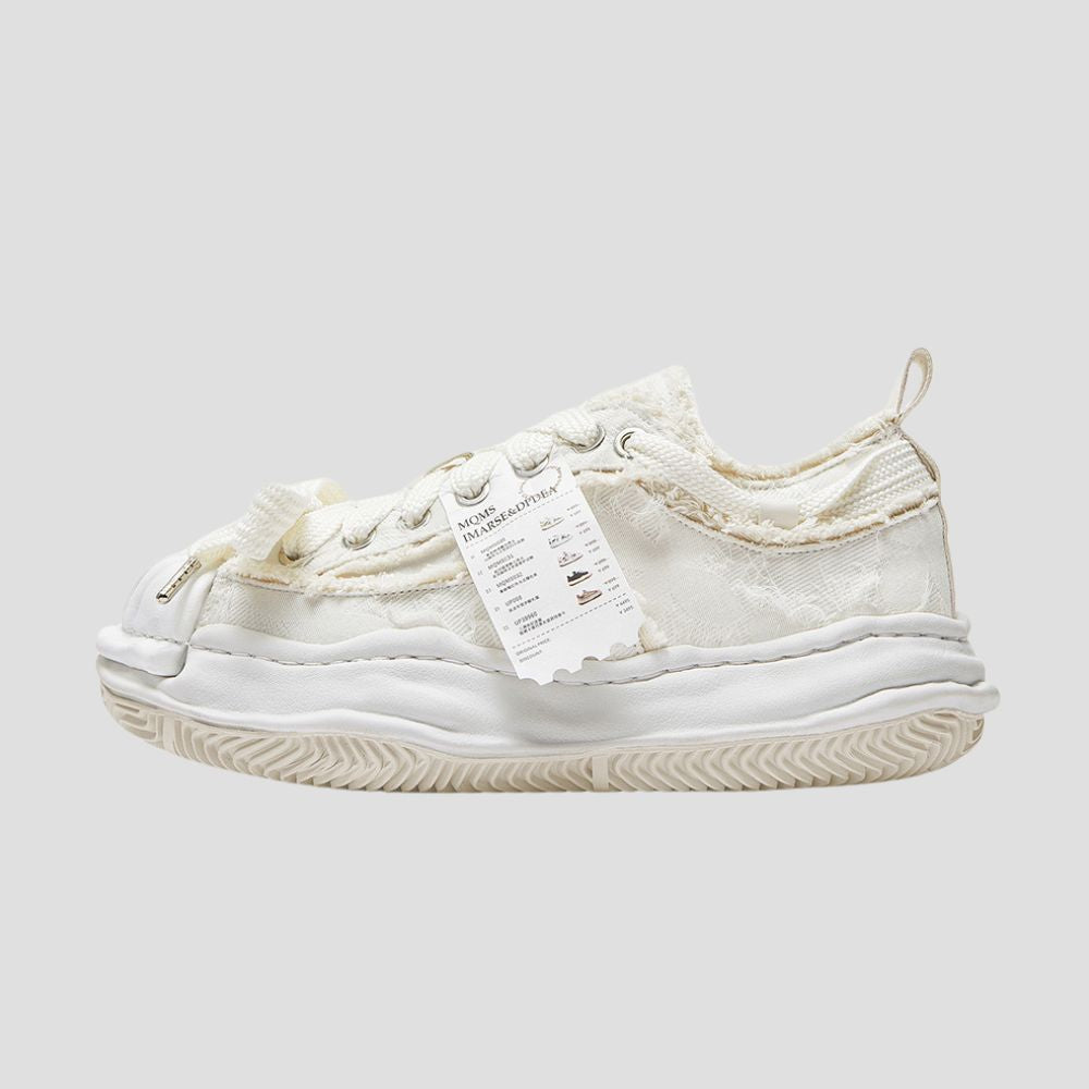 Stand out in any crowd with these unique sneakers showcasing a dissolved look.