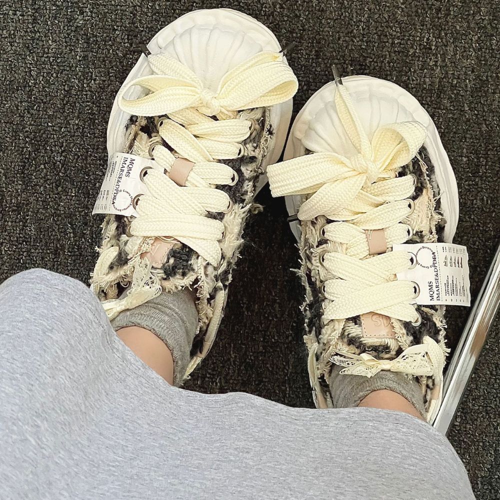 Make a statement with these stylish sneakers that combine street-style appeal with a dissolved design twist.