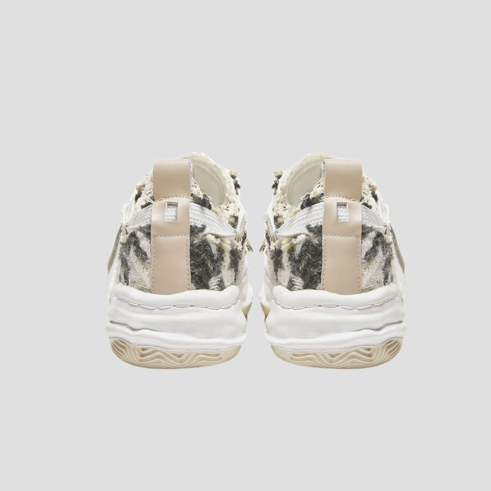 The perfect blend of comfort and style, these sneakers are crafted from soft cotton fabric.