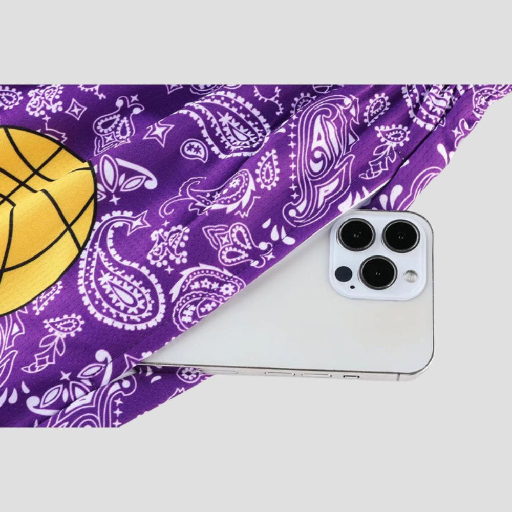 Stylish unisex shorts featuring a loose fit, athletic style, and color block design.