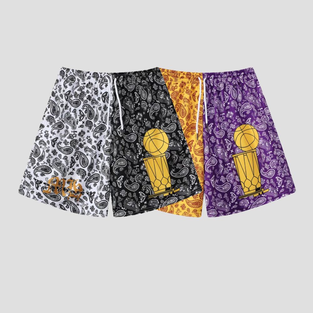 Unisex shorts with color block design, cooling fabric, and embroidery details.