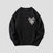 Sweater with artistic pattern decoration for casual streetwear style.
