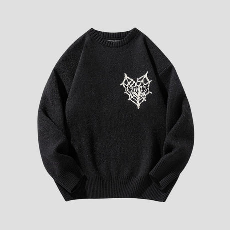 Sweater with artistic pattern decoration for casual streetwear style.
