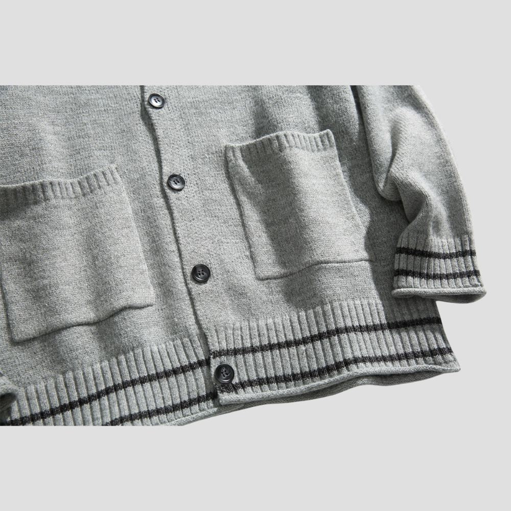 Soft and breathable sweater with stylish cardigan design.