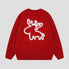 Cozy red sweater featuring festive Christmas designs
