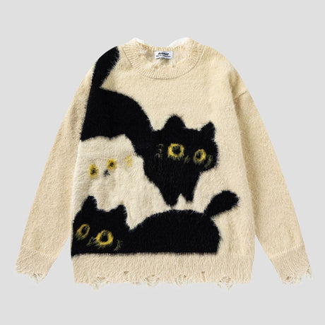 Cat embroidery detail on cozy loose fit sweater.
