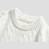 Cozy sweater with retro twist-knit design perfect for fall and winter.
