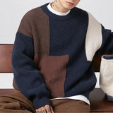Detailed view of the long sleeves on the Color Block Patchwork Sweater