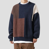 Detailed view of the long sleeves on the Color Block Patchwork Sweater