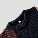 Ribbed hem design for durability and fit on Color Block Patchwork Sweater