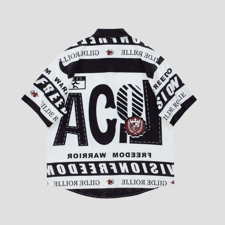 Trendy 100% cotton shirt with colorblock design and artistic lettering.