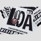 Stylish shirt with a turn-down collar, button closure, and artistic letter design.