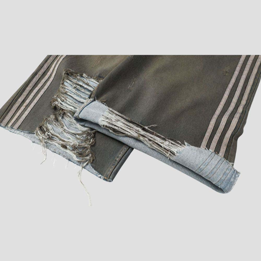 Distressed denim shorts in hip-hop fashion
