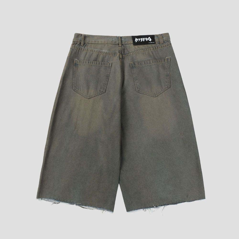 Vintage dark aesthetic denim shorts with rips