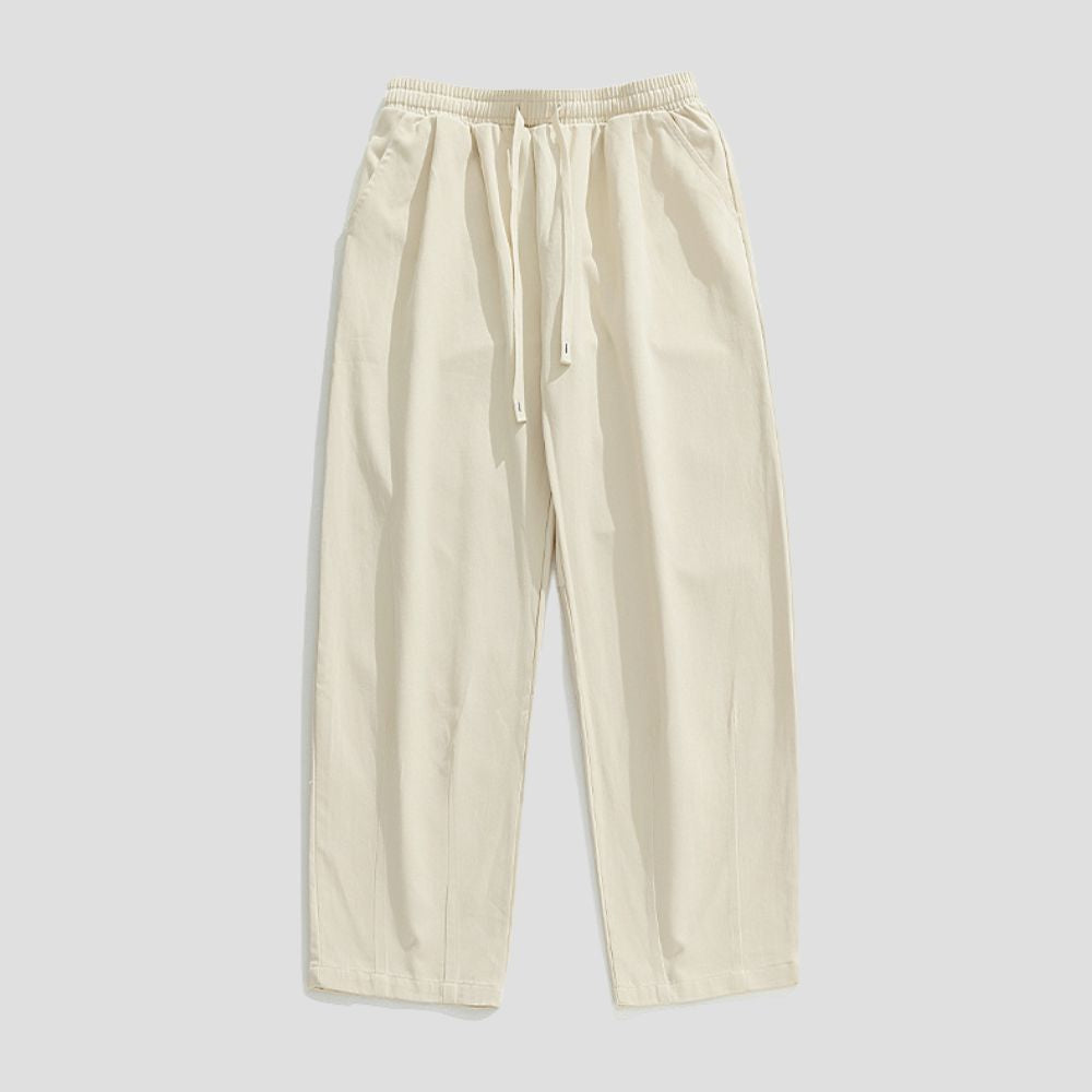 Front view of the Draped Cotton Casual Pants showcasing the relaxed fit