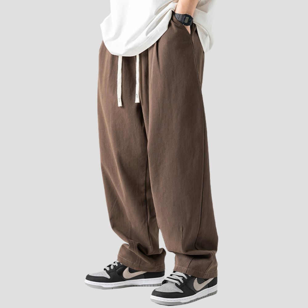 Model wearing the Draped Cotton Casual Pants for a relaxed, everyday look