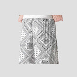 Unique faux two-piece floral print shorts.