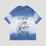 Vintage distressed tee featuring gradient colors and urban flair.