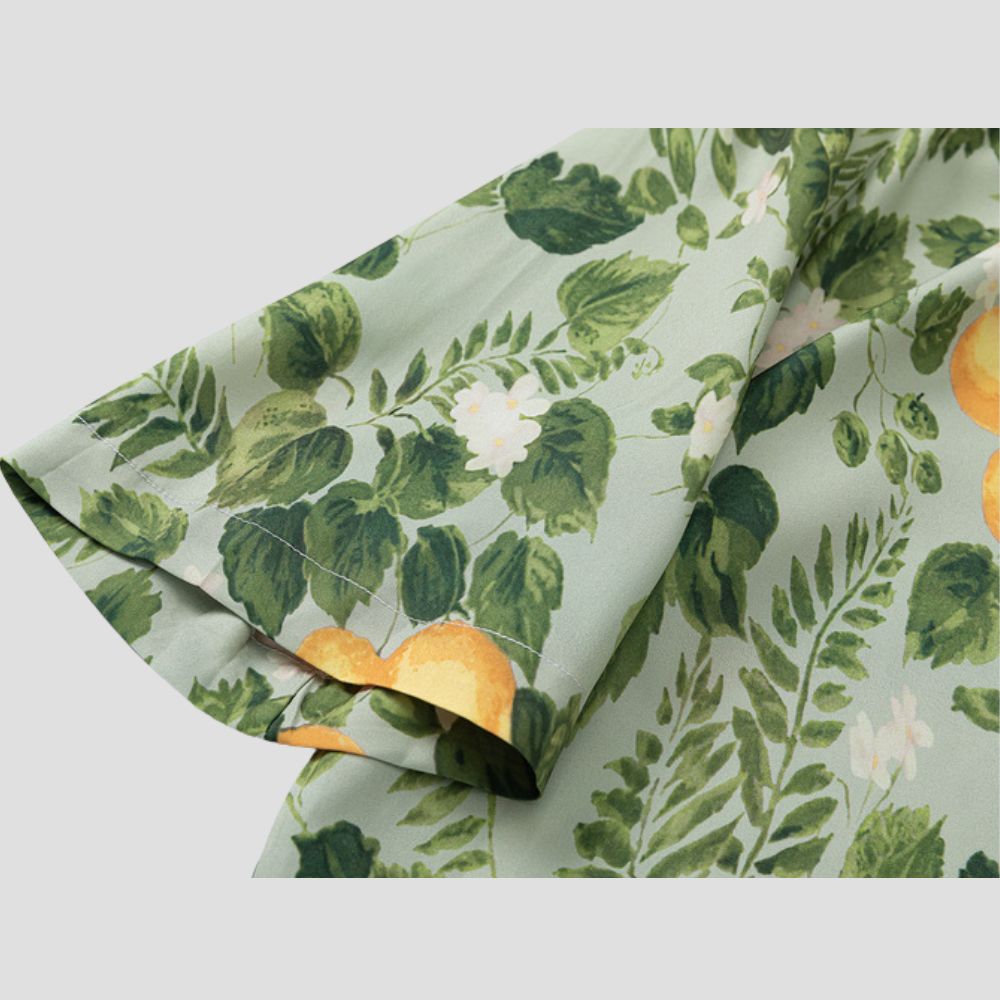 Hawaiian-style shirt with a lapel collar and cool fabric, featuring lemon tree motifs