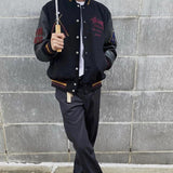 From casual to dressy, this wool blend baseball jacket is a versatile addition to any wardrobe.
