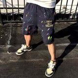 Quick-dry loose-fit shorts with artistic ink splatter