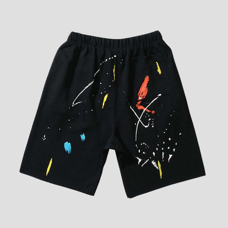 Street-style hip-hop shorts with ink splatter graffiti