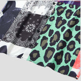 Trendy loose fit shirt with leopard print and street style, perfect for summer.