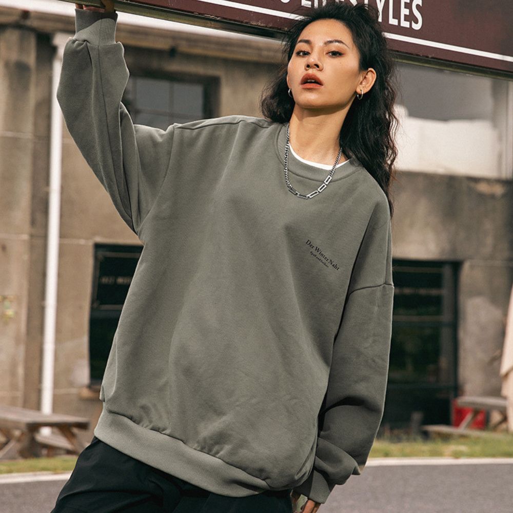 Female model wearing the Letter Printed Sweatshirt for a stylish look