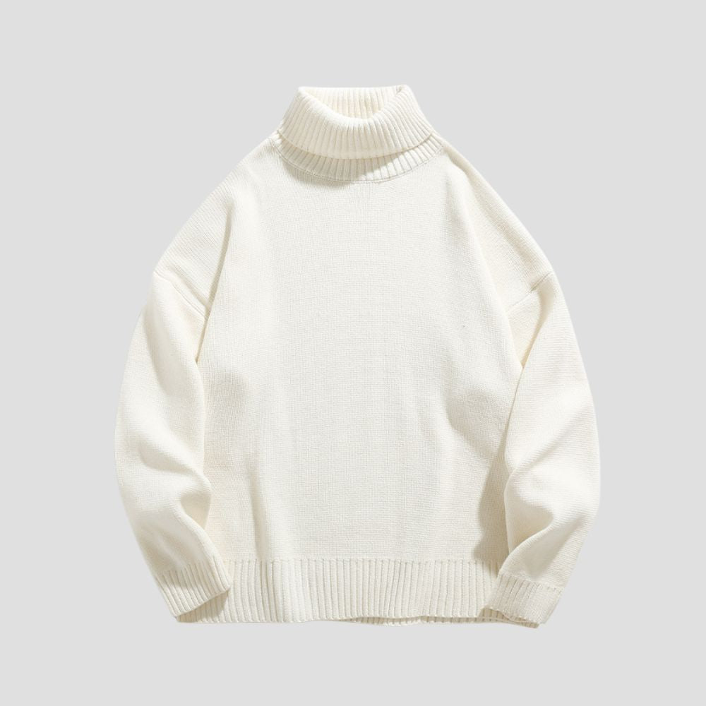 Sweater with ribbed turtleneck and relaxed fit design
