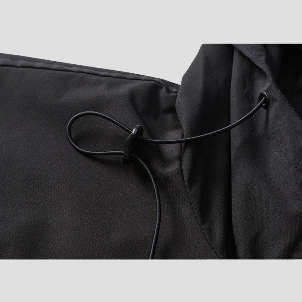 Close-up of adjustable hood on the Patchwork Softshell Jacket for added protection