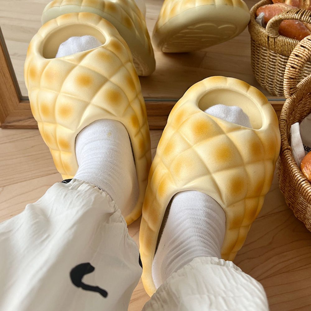 Pineapple Platform Flip-Flops on sandy beach, highlighting non-slip outsole