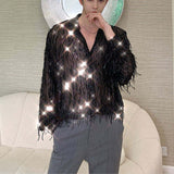 Model wearing sheer fabric sequin fringe shirt in stylish avant-garde fashion.