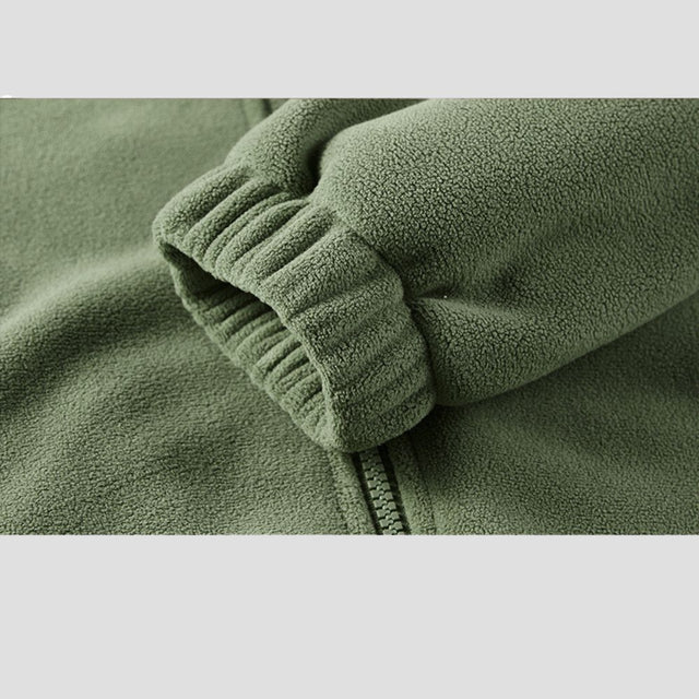Jacket shown with pockets open to display functionality.