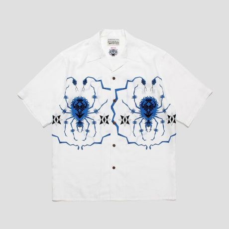 Comfortable shirt with spider embroidery, recycled fibers, and street fashion elements.