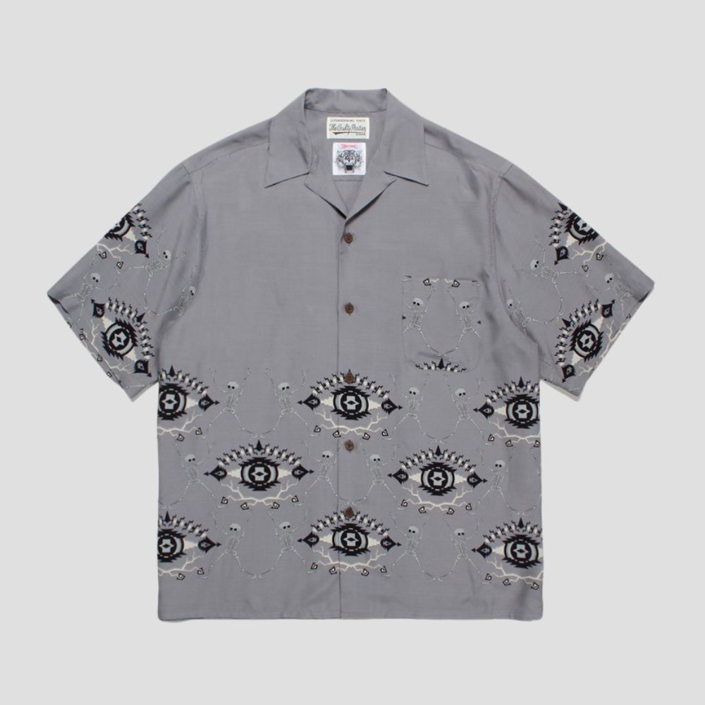 Stylish shirt with cooling fabric, spider design, loose fit, and unisex appeal.