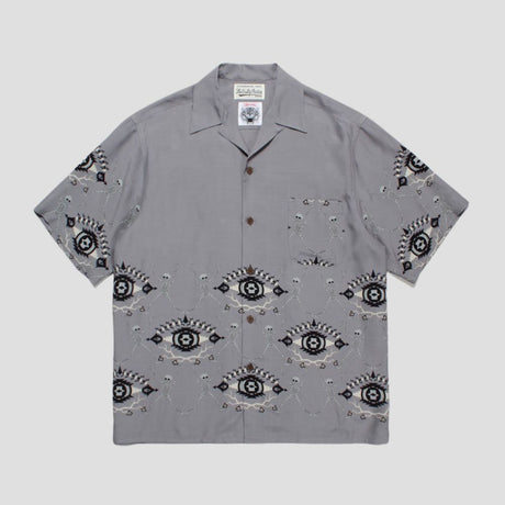 Stylish shirt with cooling fabric, spider design, loose fit, and unisex appeal.