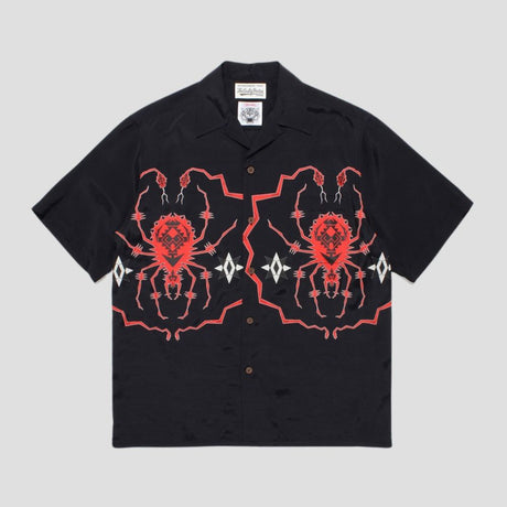 Cooling fabric shirt with spider embroidery and recycled eco-friendly fibers.