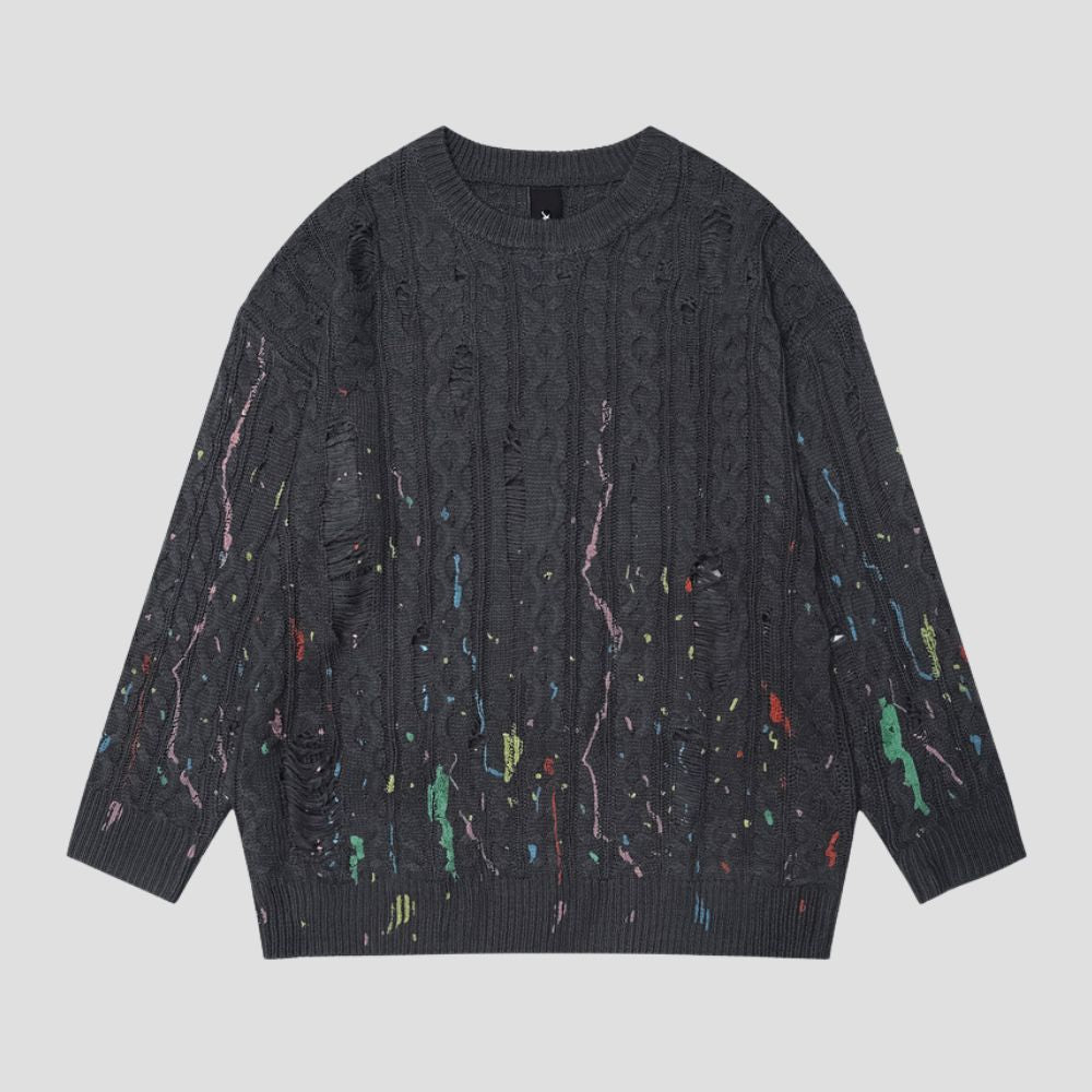 A trendy sweater featuring a bold splatter pattern design for streetwear lovers.
