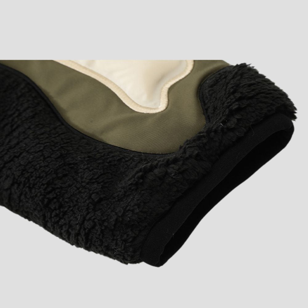 A close-up of the jacket's fabric, revealing its soft and cozy cotton texture.