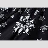 Dark blue sports shorts with graffiti pattern, perfect for streetwear style